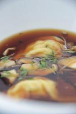 <br />Peking duck consommé with shiitake mushrooms and shaved abalone