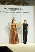 <br />Miss World Singapore contestant modelling the chocolate fashion