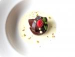 <br />Chocolate marquise served with custard sauce & toasted pistachios
