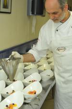 <br />Chef Corrado Assenza plating the dishes