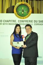 <br />Edwin Khoo presenting a certificate of appreciation to Helene Raudaschl of Indoguna