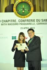 <br />Edwin Khoo presenting a certificate of appreciation
