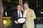 <br />Mr Peter Knipp presenting a token of appreciation to Christophe Brunet
