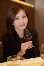 <br />Yvonne Lau enjoying a glass of Macallan whisky